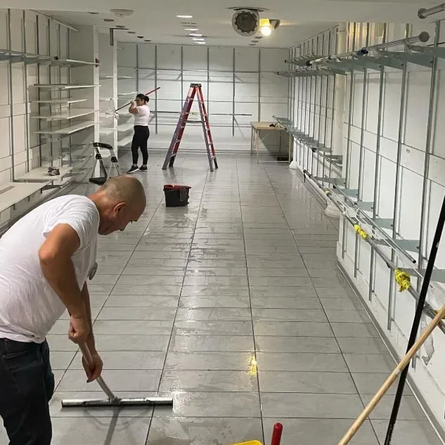 Crew cleaning a newly built-out retail space